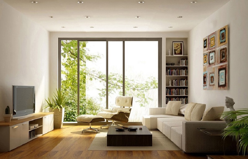 Ánh sáng từ cửa sổ kết hợp với cây xanh giúp không gian phòng khách trở nên thoáng đãng hơn
